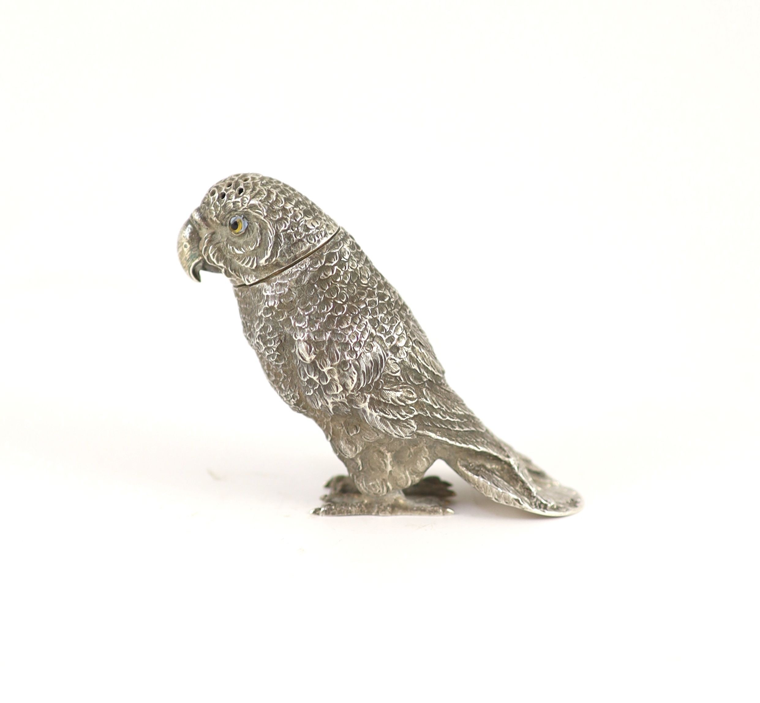 A late 19th century Hanau novelty silver pepperette, modelled as a parrot